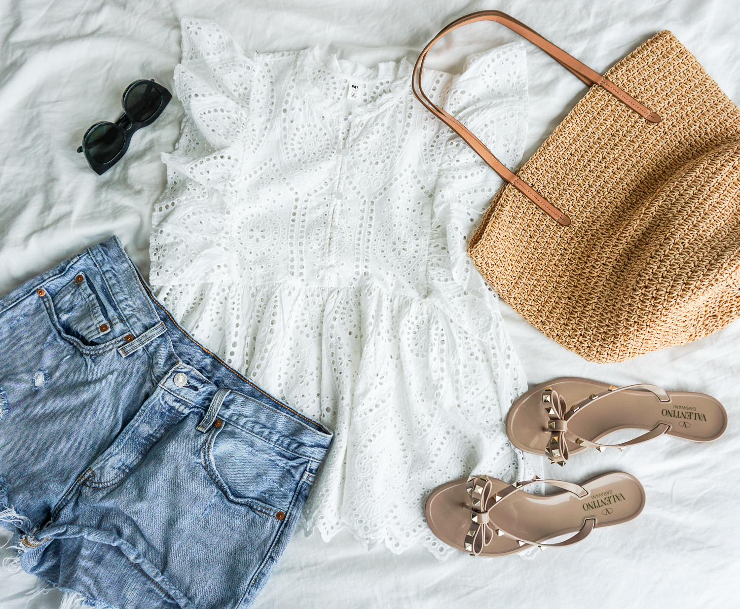 eyelet blouse and jean shorts