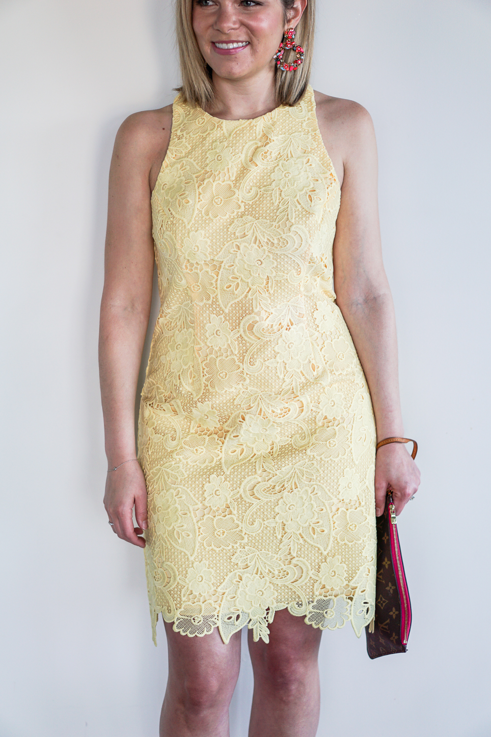 close up of yellow lace dress