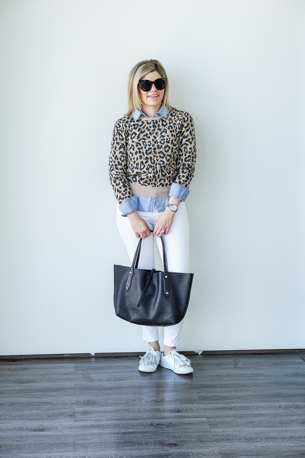 leopard sweater and white jeans